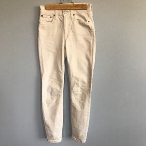 Skinny, white, size 24, woman’s jeans.
